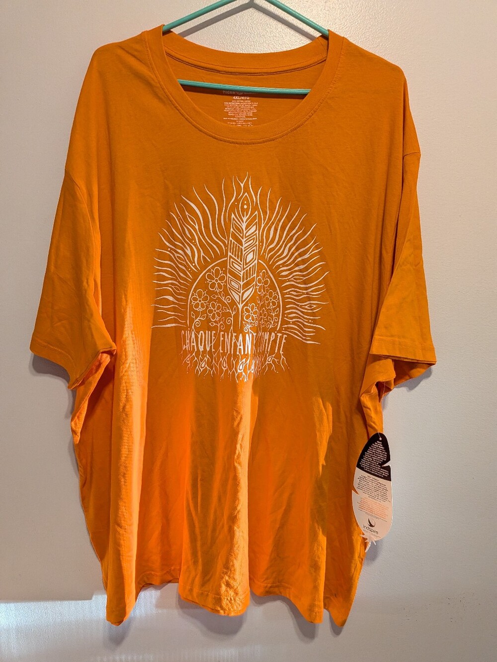 Inspire Orange Short-Sleeve Graphic Tee with White Sun & Feather Motif